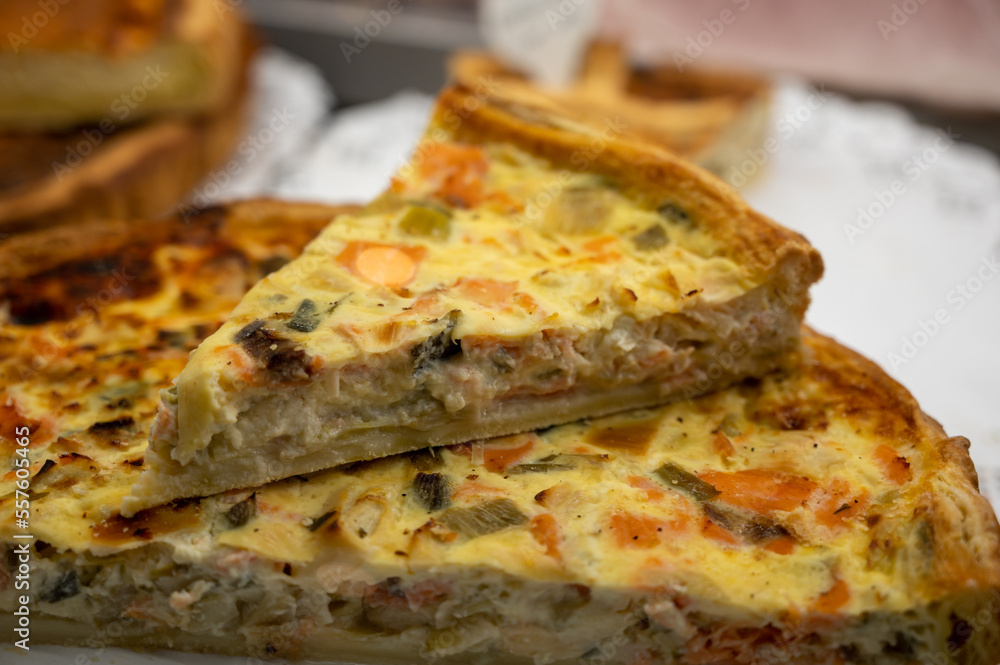 Traditional French quiche vegetable pie with green courgette and carrot Traditional French quiche vegetable pie with green courgette and carrot