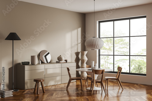 Light relaxing interior with table and chairs, panoramic window. Copy space