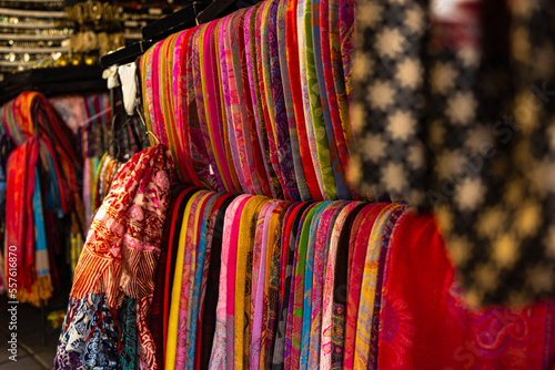 A close-up collection of vibrant, colourful scarves at the local market in Ubud, Bali, Indonesia