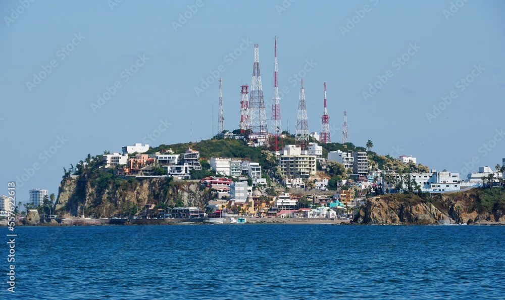 The distance view of the hill and buildings in the city near Mazatlan, Mexico