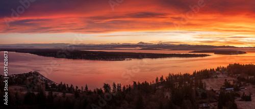 Aerial Winter Sunrise Over Hale Passage and Lummi Island. Snow blankets this lovely small island located minutes from Bellingham, Washington and accessed by a twenty one car ferry boat. 