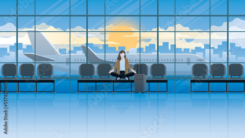 Alone calm businesswoman sits and meditates at an international airport terminal, waiting for a flight. Think of business idea solutions, solve problems, stress relief, mindfulness, breath, and relax.