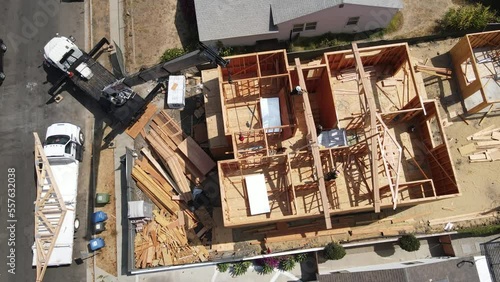 New house construction framing with crane