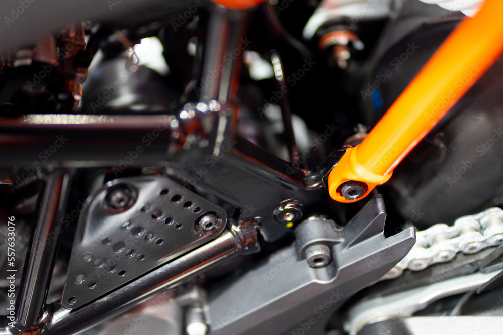 Shock absorber, powerful motorbike engine Safe driving concept, black and orange tone