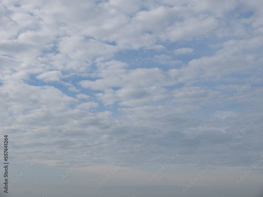 Blue sky with pattern of clouds. Cloudy sky. Blue sky with pattern of clouds. Cloudy sky.