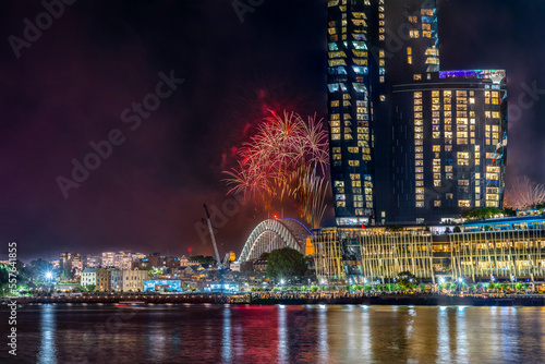 Sydney Harbour Bridge New Years Eve fireworks, colourful NYE fire works lighting the night skies with vivid multi colours NSW Australia. Happy New Year. New Year Eve