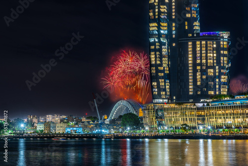 Photography Sydney Harbour Bridge New Years Eve fireworks, colourful NYE fire works lighting the night skies with vivid multi colours NSW Australia