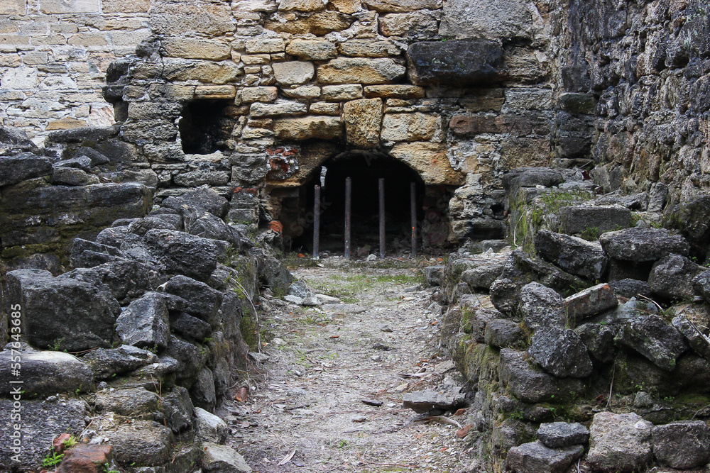 Gated water drainage in ruins Gated water drainage in ruins