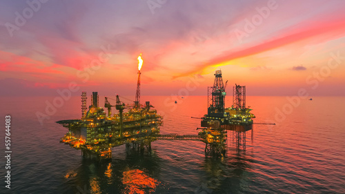 Areal photography from top view of jack up rig scenery with blue ocean view.