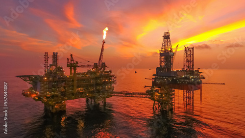 Areal photography from top view of jack up rig scenery with blue ocean view.