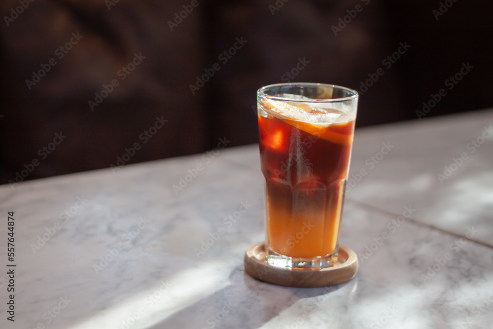 Glass of americano mixed with orange juice
