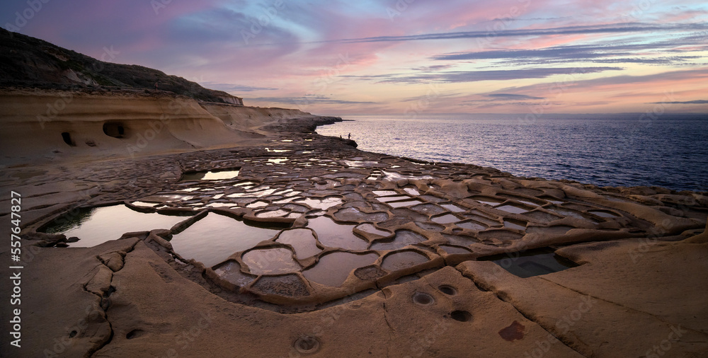 Salt Pans on the island of Gozo in Malta at sunset - obrazy, fototapety, plakaty 