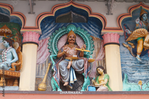 Sculpture of the Hindu God Dharmaraj on the wall of hindu temple in Mayapur, India.