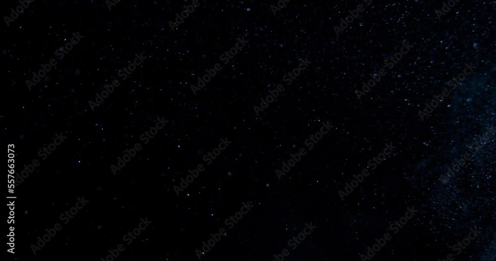 Cinematic dust particles floating on Black Screen Overlay. RED camera footage in slow motion. High quality 4k footage Cinematic dust particles floating on Black Screen Overlay. RED camera footage in slow motion. High quality 4k footage