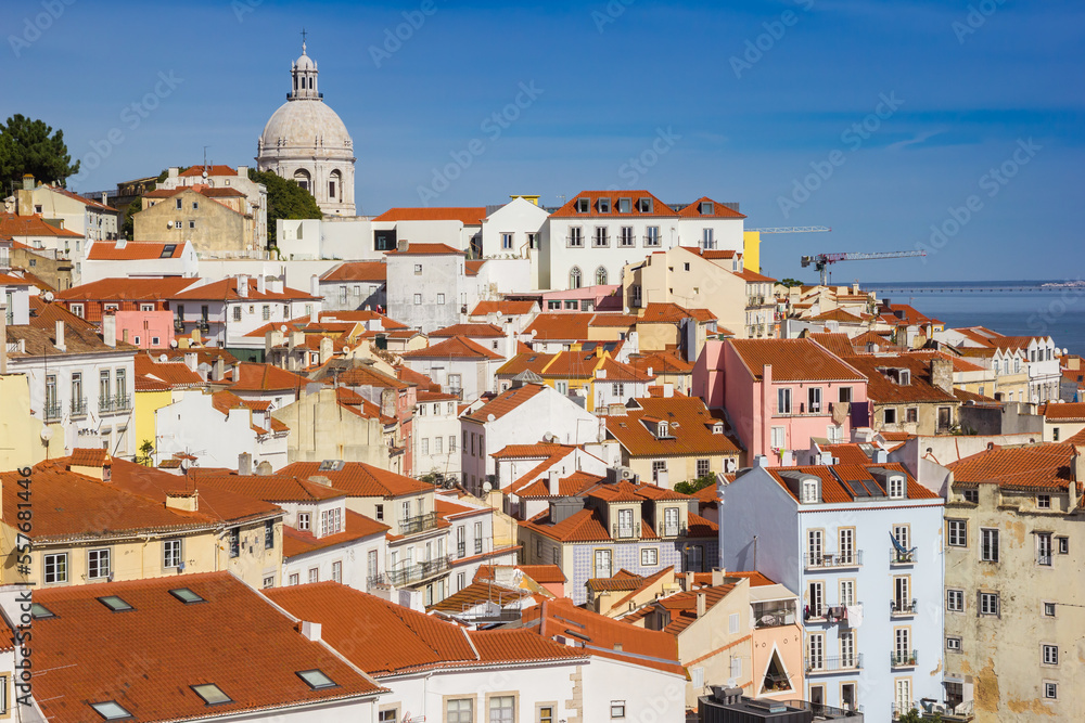 Colorful houses and the dome of the Santa Engracia church in Lisbon, Portugal
