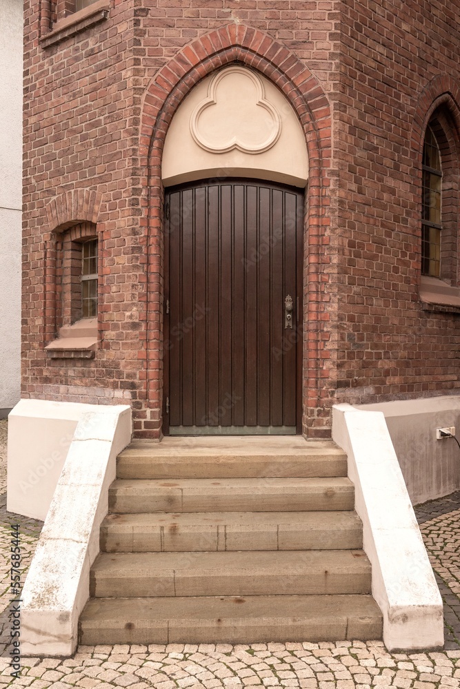 wooden door entrance to the church