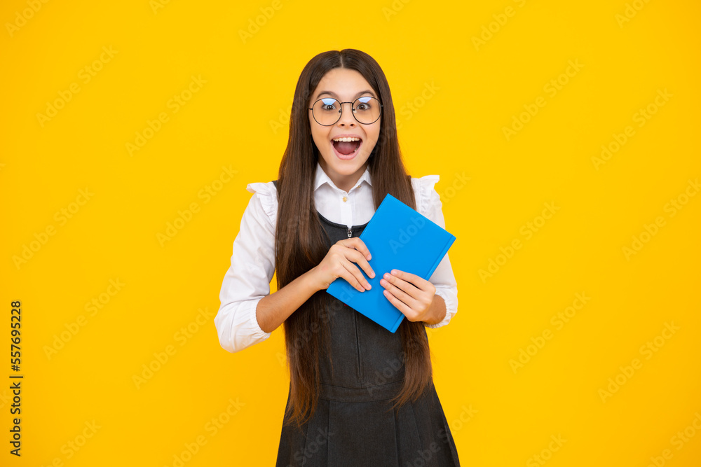 Teenager school girl study with books. Learning knowledge and kids education concept. Excited face, cheerful emotions of teenager girl. Teenager school girl study with books. Learning knowledge and kids education concept. Excited face, cheerful emotions of teenager girl.
