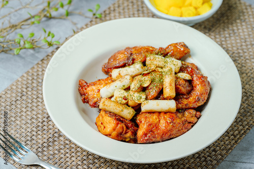 yangnyeom chicken, Korean Seasoned Fried Chicken : This dish is seasoned chicken cut into pieces, deep- fried, and mixed with soy sauce, gochujang, or other sauces. It has a mild yet spicy taste that 