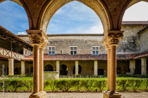 View on the arcades of the medieval cloister of the romanesque abby of Flaran in the south of France (Gers) photo