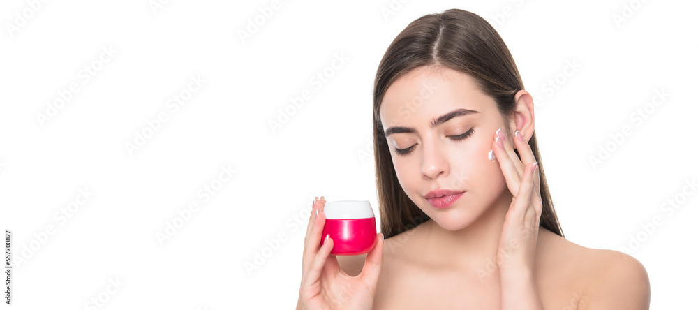 Beauty woman skin. young girl applying cream for face skin isolated on white background, daily habit. Woman beauty face, close up portrait, isolated banner with copy space. Beauty woman skin. young girl applying cream for face skin isolated on white background, daily habit. Woman beauty face, close up portrait, isolated banner with copy space.