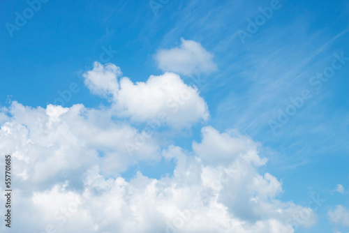 many beautiful white clouds in the sky.