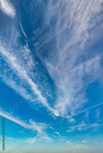Fantastic clouds against blue sky, panorama