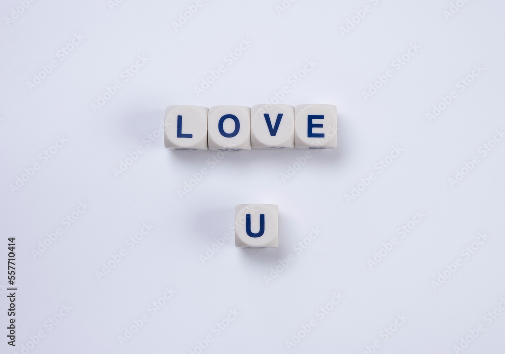 text love u from cubes with letters on a white background text love u from cubes with letters on a white background