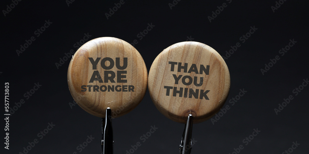 Motivational and inspirational quote wrote on wood. You are stronger than you think. Motivational and inspirational quote wrote on wood. You are stronger than you think.