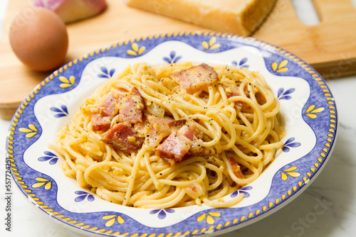 Carbonara pasta. Carbonara is an Italian pasta dish from Rome made with eggs, hard cheese, cured pork, and black pepper.