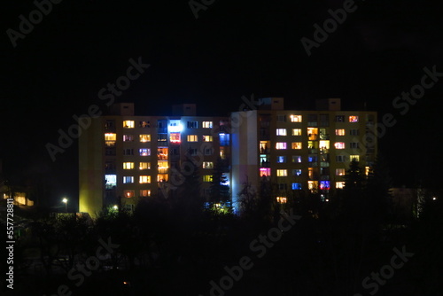 Wallpaper Mural tower building in black dark night with very colorful illumination and lights in kremnica in slovakia Torontodigital.ca