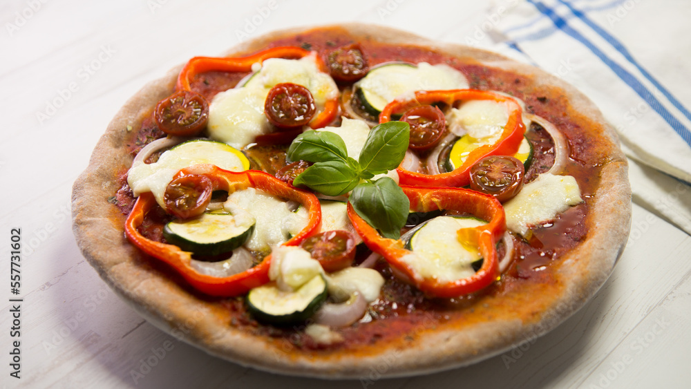 Pizza with vegetables. Neapolitan pizza made with baked vegetables. Italian vegetarian recipe.