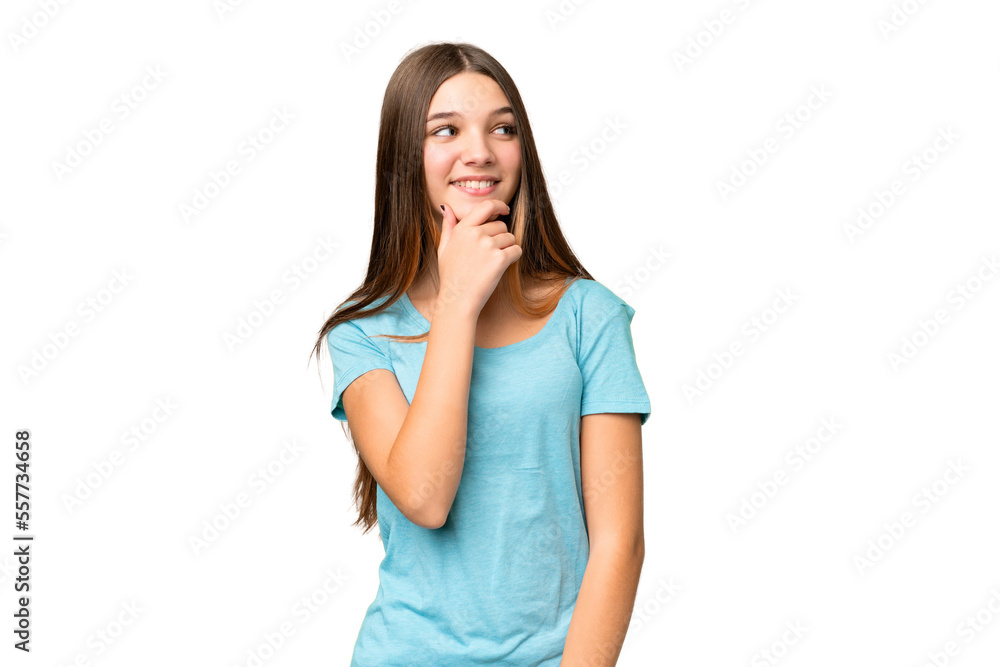 Teenager girl over isolated chroma key background looking to the side and smiling Teenager girl over isolated chroma key background looking to the side and smiling