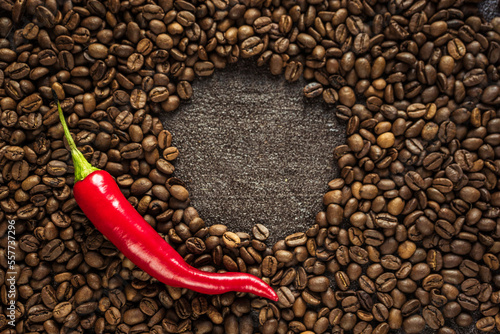 aromatic coffee beans with bitter hot chili pepper on a black background 4