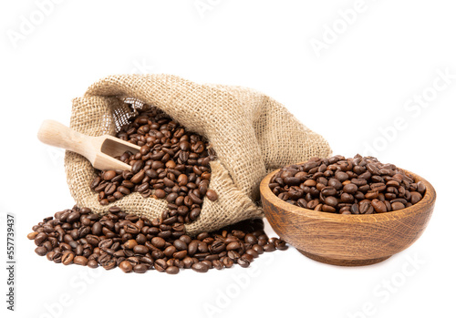 Coffee beans in a burlap bag and a wooden plate isolated on a white background. Place for copy space. Place for text. MOCAP © Avocado_studio