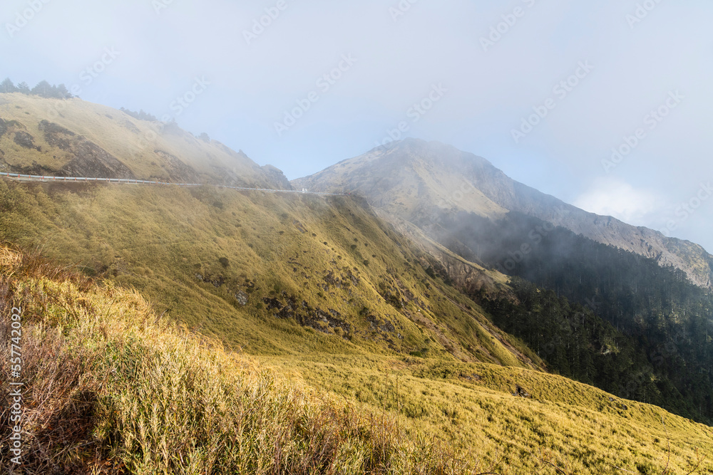 Naklejka premium Layers of magnificent mountains landscape in Hehuanshan of Nantou, Taiwan. Taroko National Park is one of Taiwan's most popular tourist attractions.