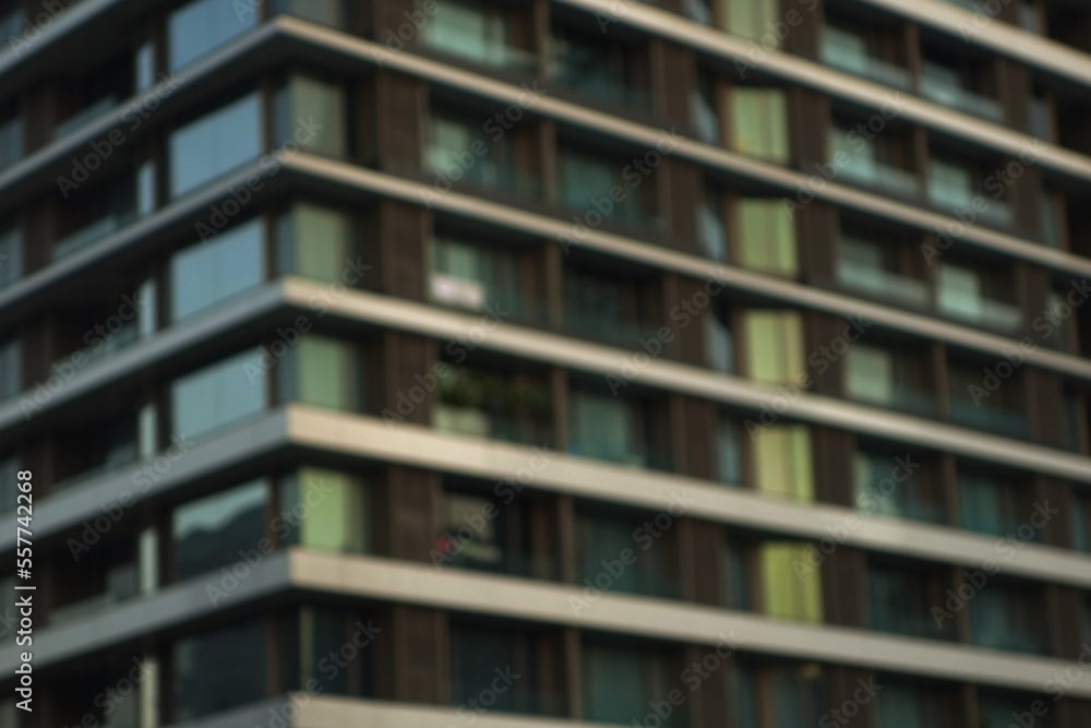 Blur modern urban apartment building exterior in evening. Blur modern urban apartment building exterior in evening.