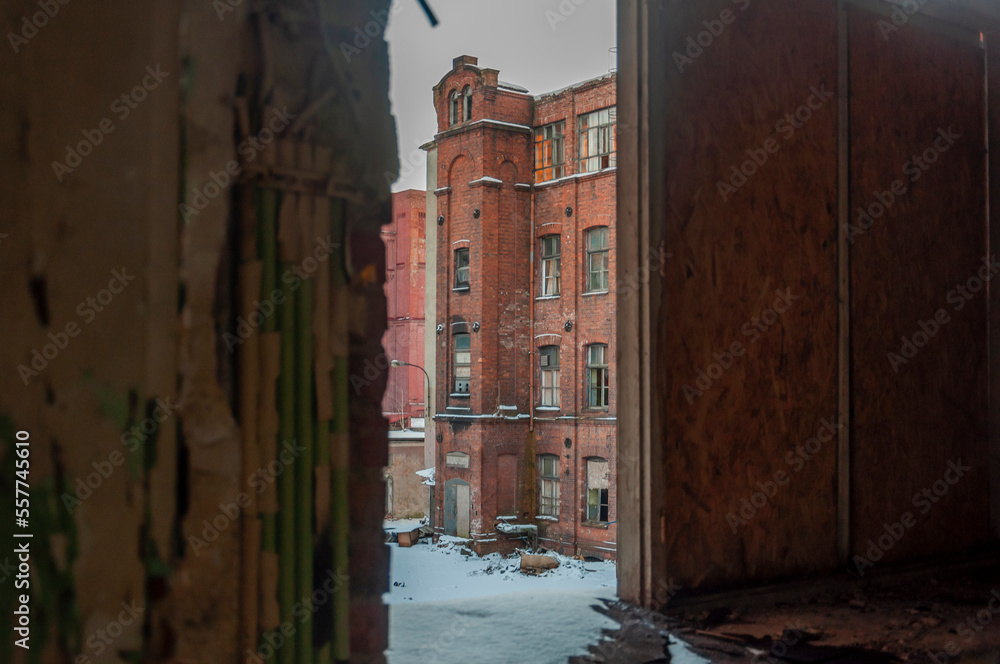 Old abandoned haunted red brick factory of stockings, pantyhose and socks in Central Europe, Poland Old abandoned haunted red brick factory of stockings, pantyhose and socks in Central Europe, Poland