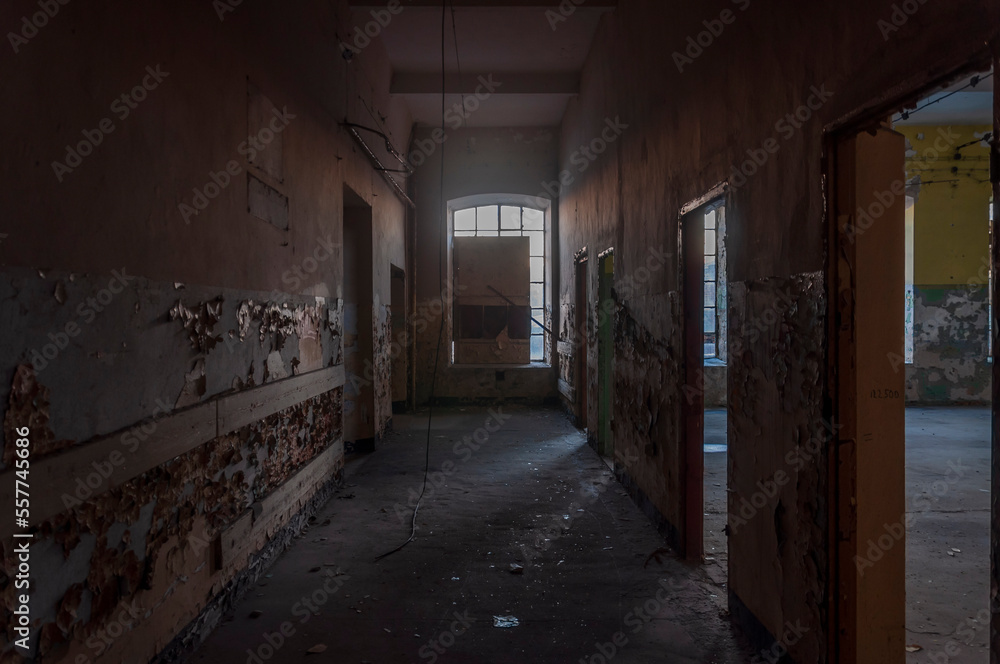 Old abandoned haunted red brick factory of stockings, pantyhose and socks in Central Europe, Poland