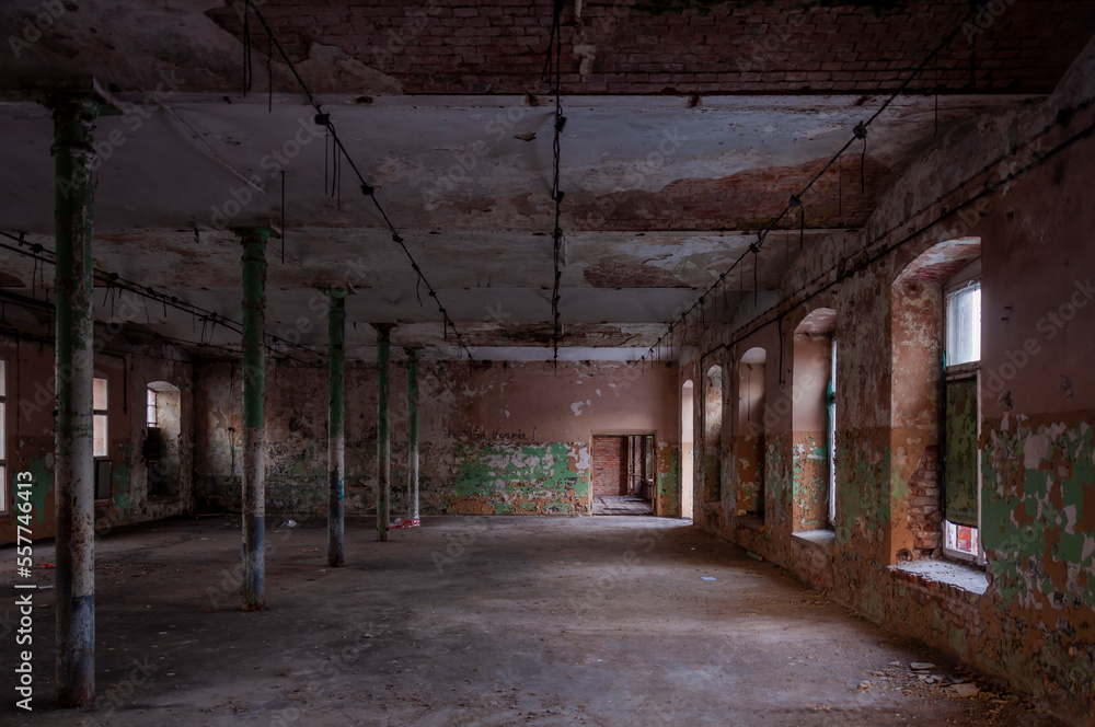 Old abandoned haunted red brick factory of stockings, pantyhose and socks in Central Europe, Poland