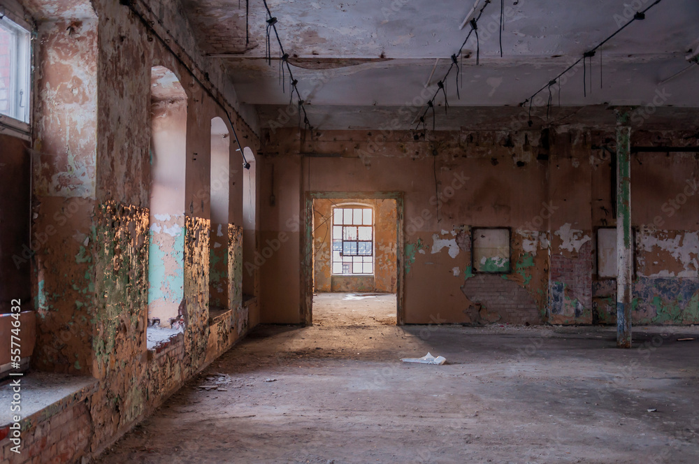 Old abandoned haunted red brick factory of stockings, pantyhose and socks in Central Europe, Poland