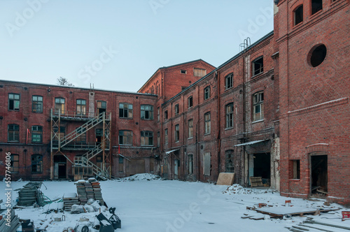 Old abandoned haunted red brick factory of stockings, pantyhose and socks in Central Europe, Poland © Arkadiusz