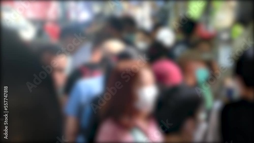 Wallpaper Mural Blurred crowd of people shopping at Sampeng Market, many street stalls retail and wholesale shop near historic Chinatown. Point of view shot daytime, Bangkok, Thailand Torontodigital.ca