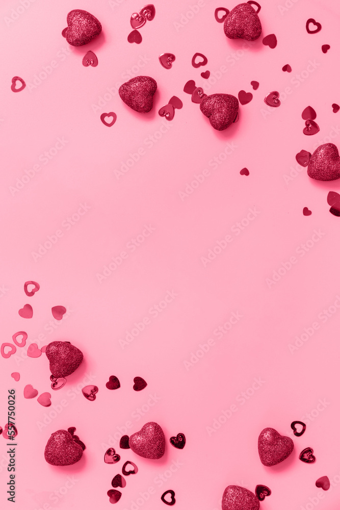 Valentines, love and wedding concept ideas. Frame red hearts on pink background. Flat lay, top view. Trendy color of year 2023 - Viva Magenta.