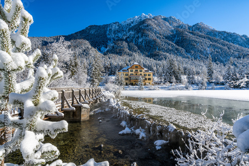Obraz na plátně A sunny winter morning ata snowy and iced Lake Dobbiaco, Province of Bolzano, Trentino Alto Adige, Italy