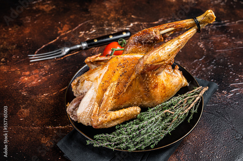 Canvas Print Roast guinea fowl with herbs and spices, cooked game bird