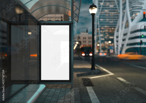 3D rendering.Vertical blank billboard at bus stop on evening  city street where skyscrapers, people and colorful cars driving on roads. Mock up with reflection. 3D illustration (ID: 557767204)