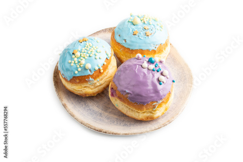 Purple and blue glazed donut isolated on white, side view.