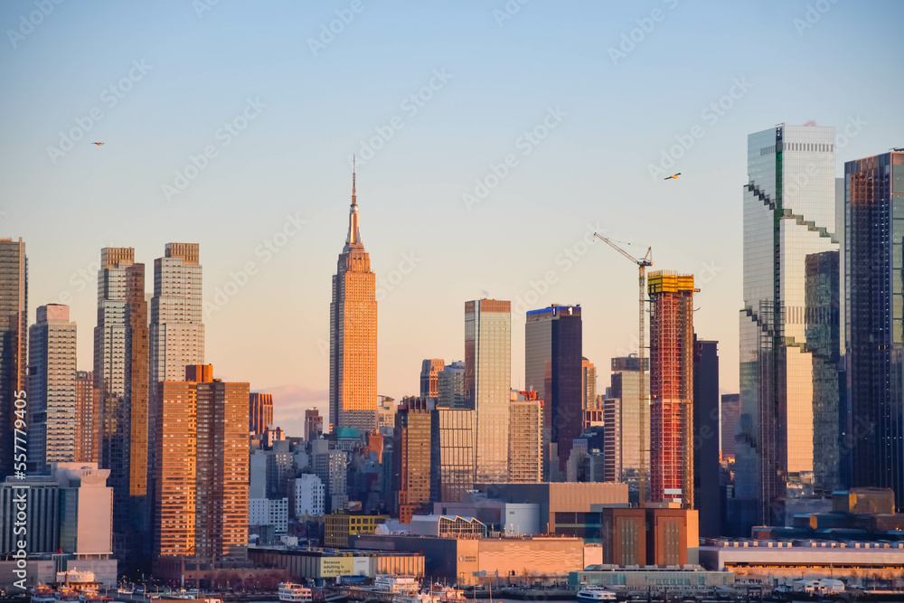 Fototapeta premium Manhattan skyline buildings in perfect setting sunlight, saturated background graphic resources travel photo