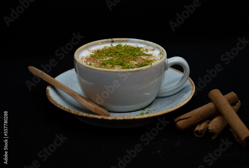 salep drink cafe cup art sahlep,
top view and cinnamon sahlep photo