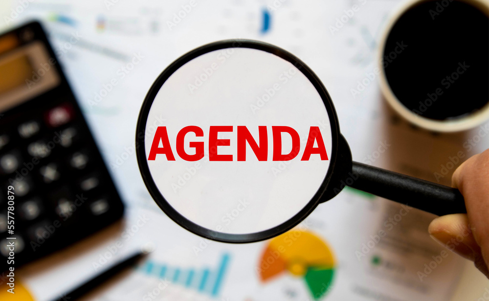 Agenda symbol. Magnifying glass with the concept word agenda on beautiful white background. Agenda symbol. Magnifying glass with the concept word agenda on beautiful white background.